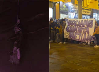 A Bologna i centri sociali appendono un fantoccio di Giorgia Meloni a testa in giù